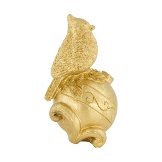 Vogel auf Goldkugel